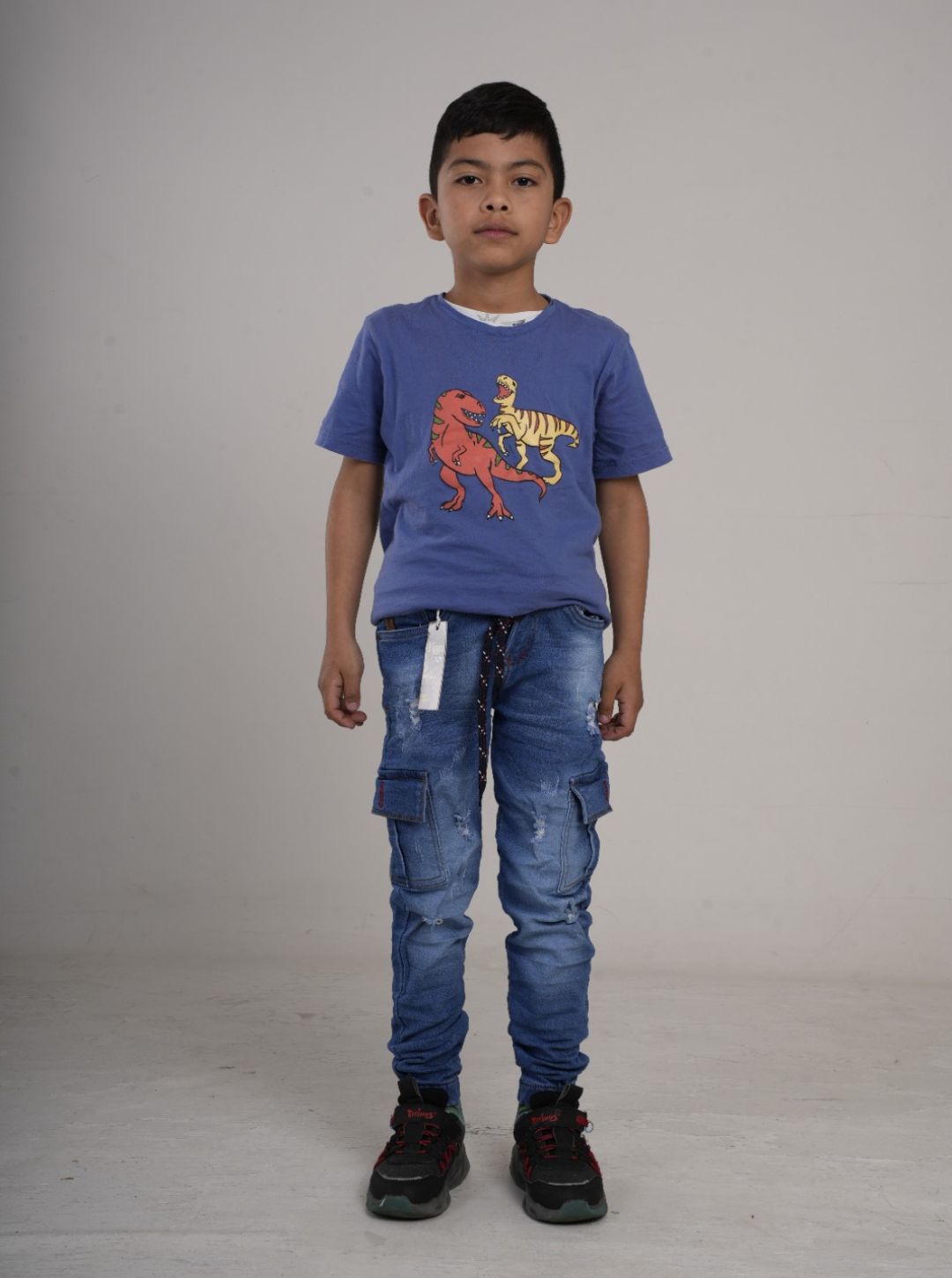 Pantalón en Jean cargo rígido camuflado para niño