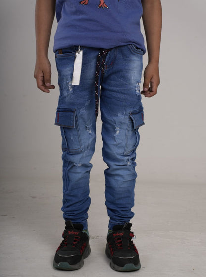 Pantalón en Jean cargo rígido camuflado para niño