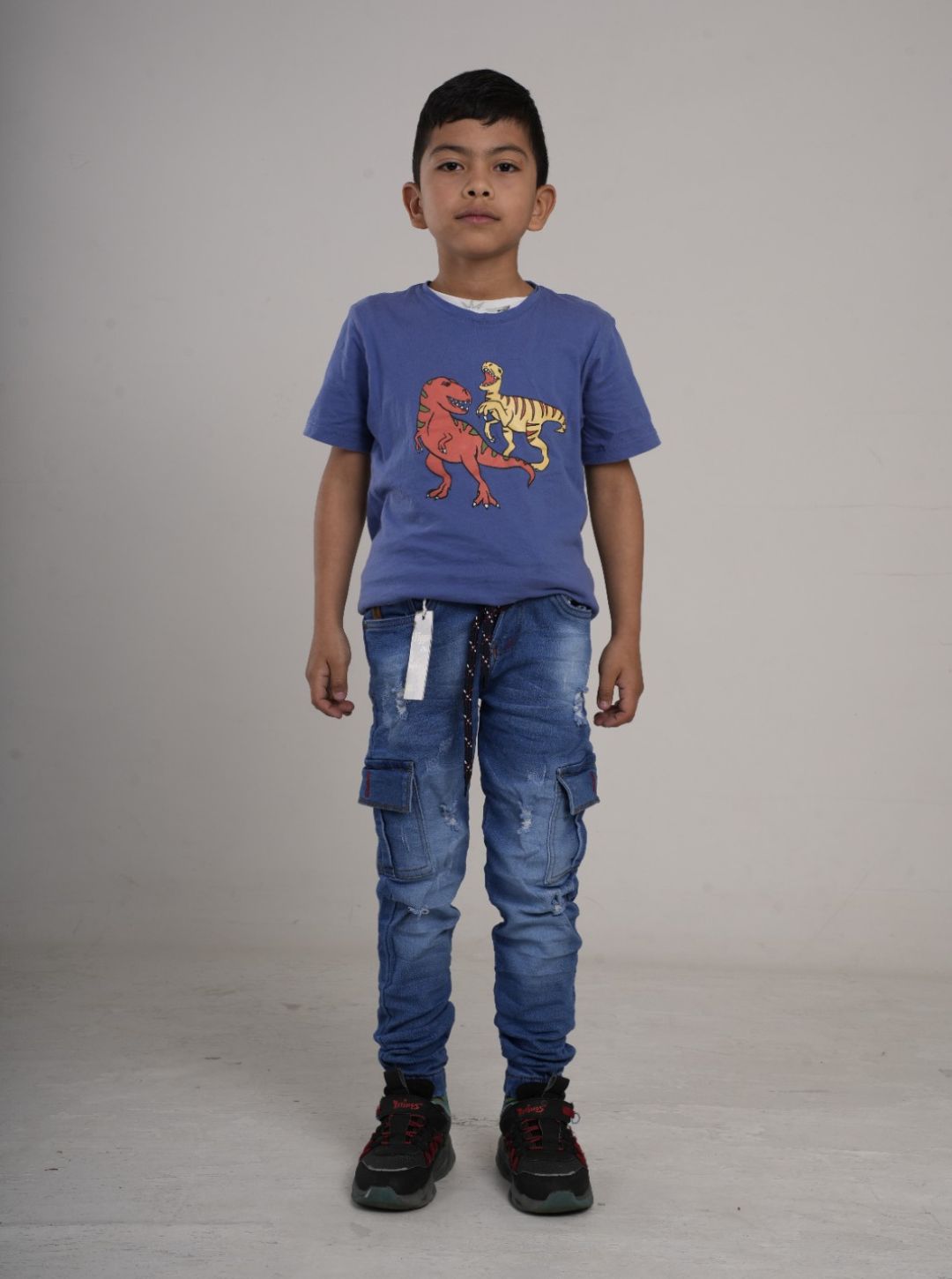 Pantalón en Jean cargo rígido camuflado para niño